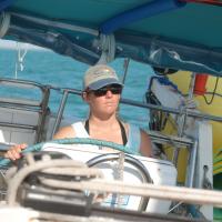 Crew on the Grant Nellie taking a turn at piloting