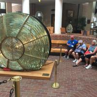 Bill, Dorothy, Sandra and Bill admiring the Clamshell Lens at CG Station