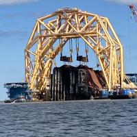 Cutting machine for overturned container ship