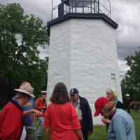 Group gathering in front of the Stony Point Lighthouse