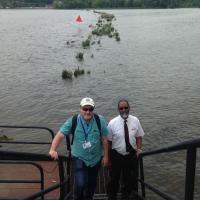 Rich and Thomas climbing up the ladder at Rondout Creek Lighthouse