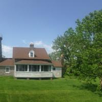Beautiful shot of the Windmill Point Lighthouse and the property