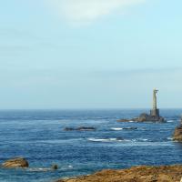 Nividic Lighthouse with German cable towers built to bring electricity to the lighthouse but never completed
