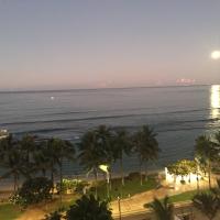 View from hotel room of Waikiki with full moon