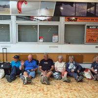The only place to sit and wait out the ferry delay to Jersey was on the floor.