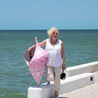 Lisa with Pink Shell on Telchac Pier