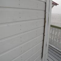 A different section of siding replaced and primed