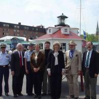 From left to right: CAPT Curt Springer, Commander Activities Baltimore, U.S. Coast Guard; Congressman Ben Cardin, 3rd District MD; RADM Brice-O’Hara; Ginger Ellis, Anne Arundel County, Environmental & Cultural Resources; Chief of Staff, IWIF; Secretary Norton; Mr. Wheeler, U.S. Lighthouse Society; and Mr. Gonzalez, U.S. Lighthouse Society.