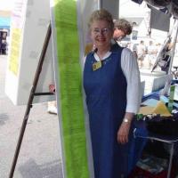 Sandy Clunies, Chesapeake Chapter Historian, stands by the list of descendants of Keeper Suit that she researched and which led to her contacting the Martak brothers